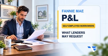 Self-employed business owner reviewing a profit and loss statement for a Fannie Mae mortgage