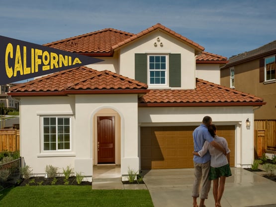 california real estate property with couples standing in front of it for mortgage loans